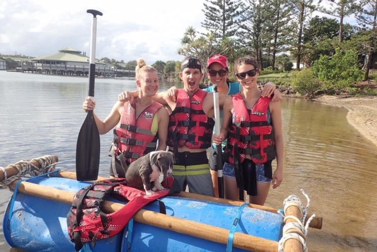 A hens group with their finished raft at the water's edge