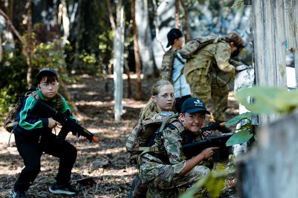 A group moving through the outdoor arena at XperiencesHQ on the Sunshine Coast